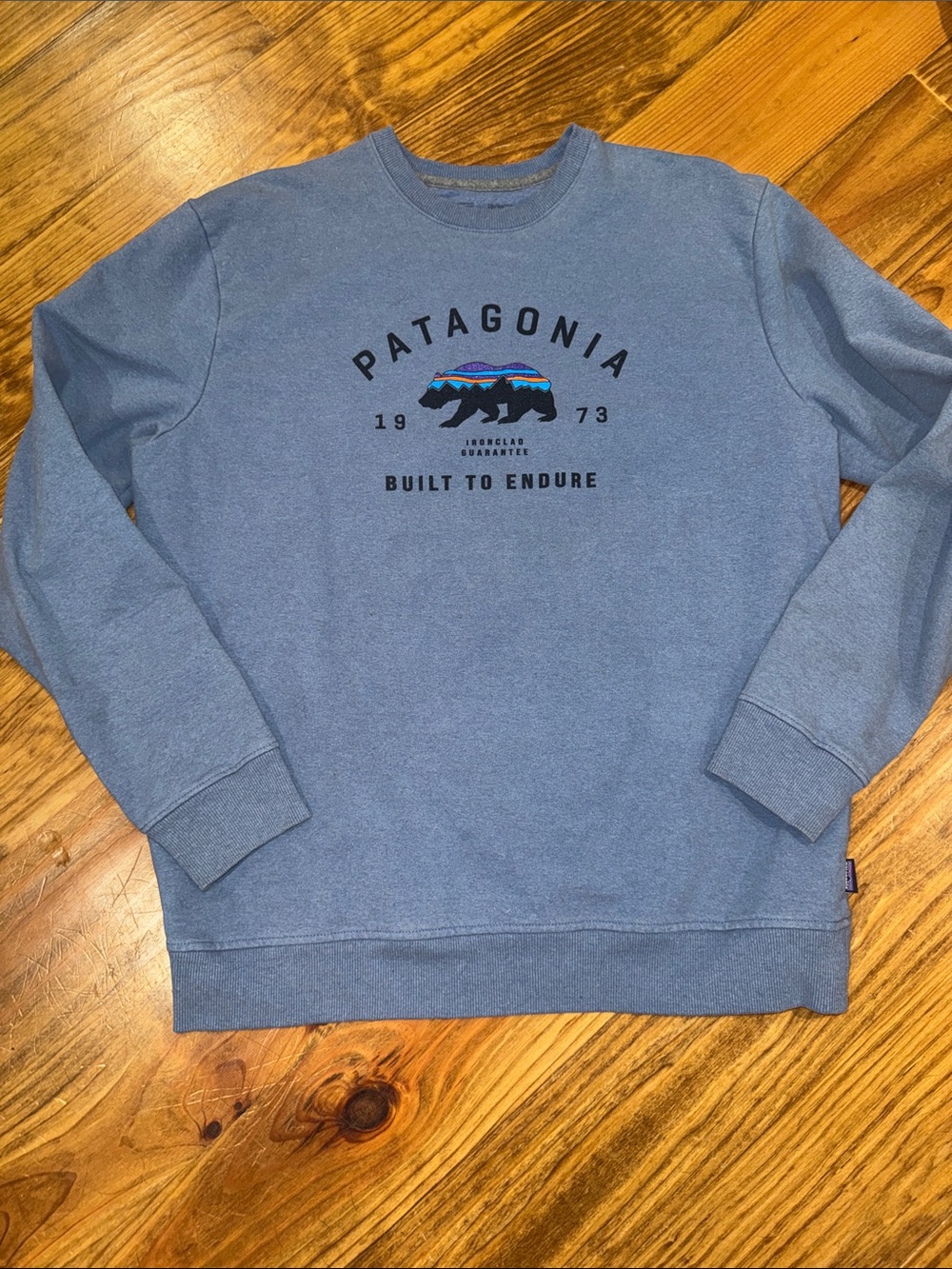 Patagonia Men's Heather Blue Crewneck Sweatshirt with Graphic Bear Logo